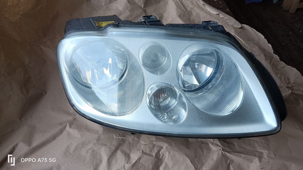 Farol VW touran ótica original óptica 2004