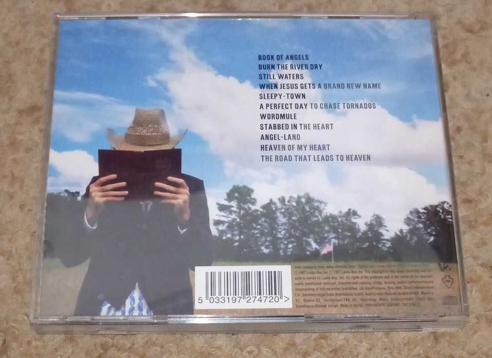 Jim White - The Mysterious Tale of How... (1997)64550978929537121