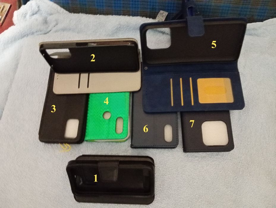 Чехлы-книжка для телефонов.Новые.