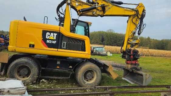caterpillar 314 f rototilt widły do palet