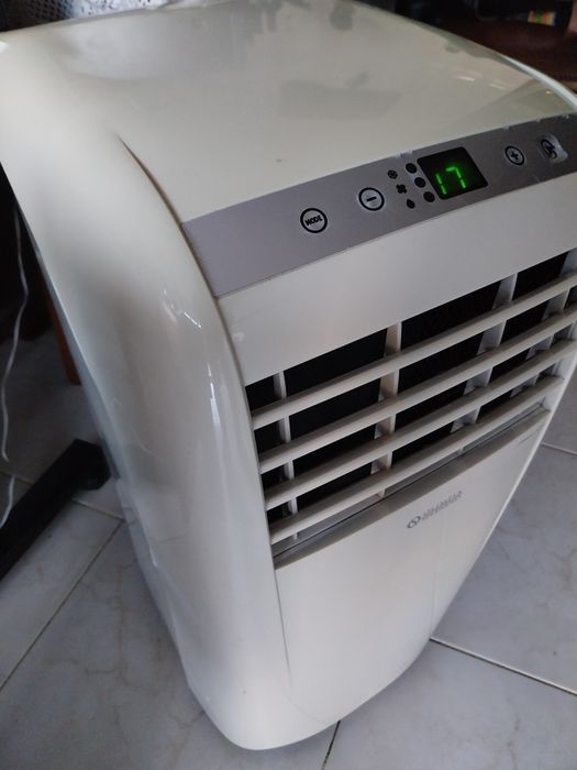 Aparelho de ar condicionado impecavel