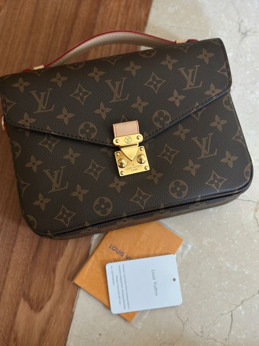 Mala Louis Vuitton em excelente estado.