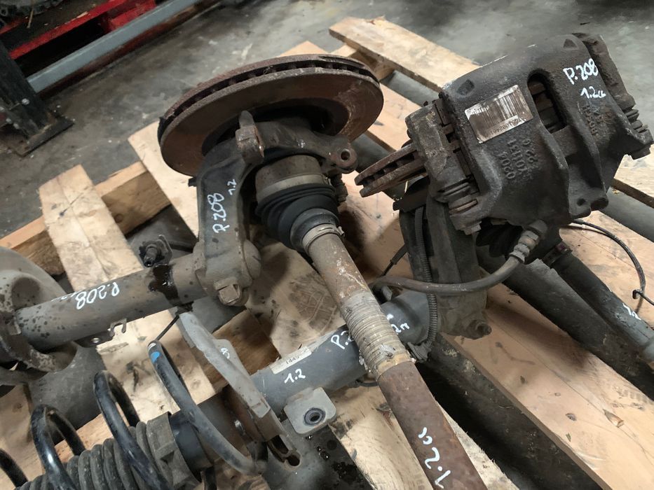 Manga de Eixo\Caixa de direção\Amortecedor Peugeot 208 1.2