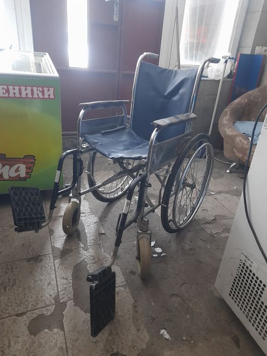 Инвалидная коляска в рабочем состоянии.