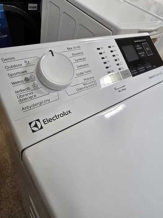 Вертикальна пральна машинка Electrolux EWT1136 бу стан топ стиральная