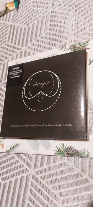 charger "confessions of a man"Iwyd.2003