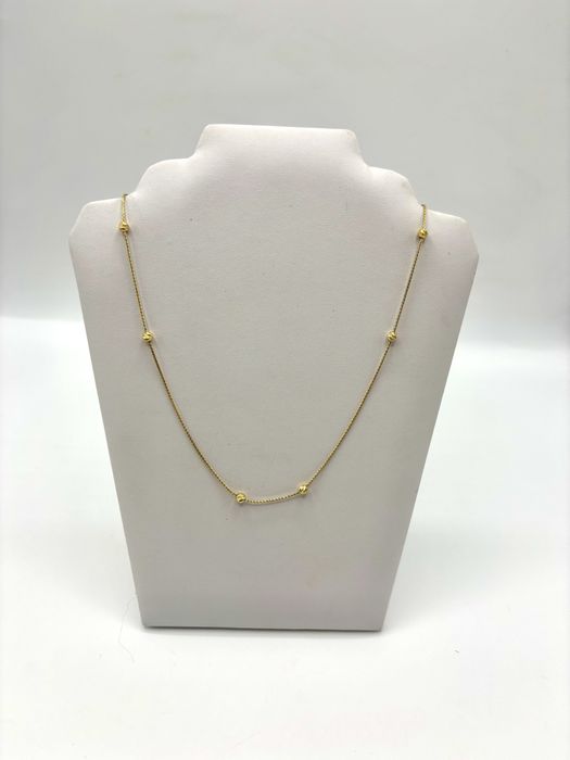 Złoty naszyjnik z kulkami rychomymi regulowany