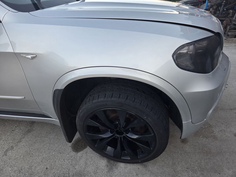 Błotnik prawy przedni BMW X5 E70 titansilber 354/7 oryginał w kolor przód przedlift