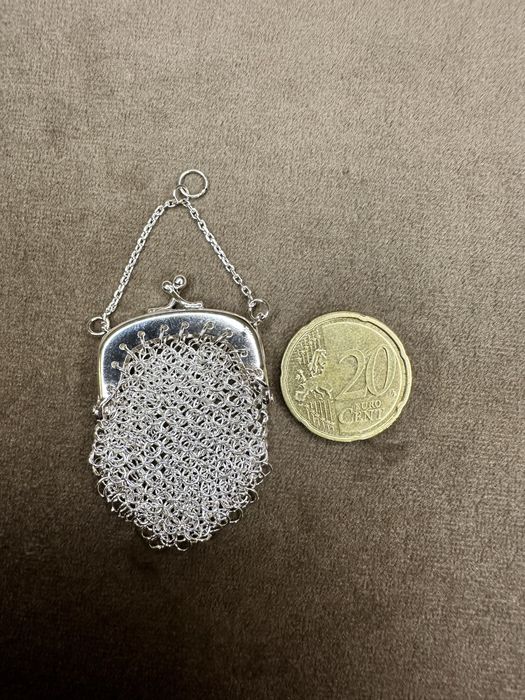 Medalha porta moedas em prata