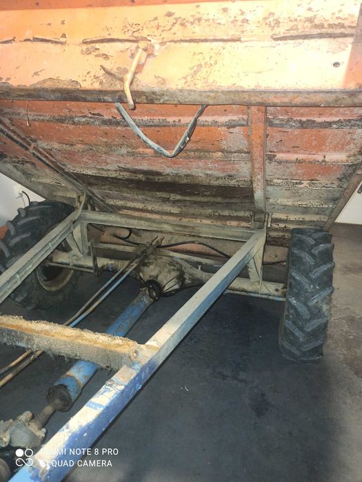 Reboque motocultivador basculante