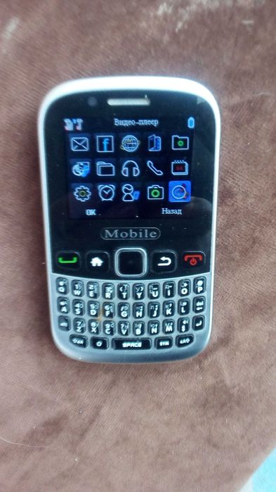 Многокнопочный телефон