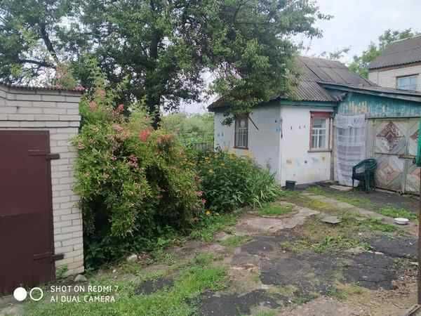 Продам дом и жилой флигель в Мерефе!