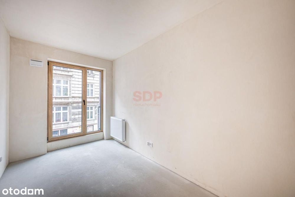 2-pokojowy apartament w sąsiedztwie odrestaurowanych kamienic.