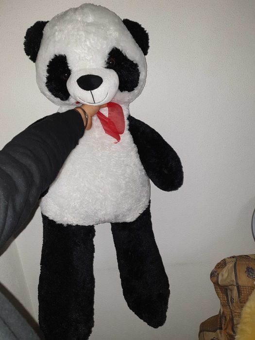 Peluches panda e leão