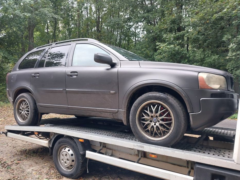 Części volvo xc90 2.4 d5 silnik skrzynia drzwi skóra lampa szyba hak