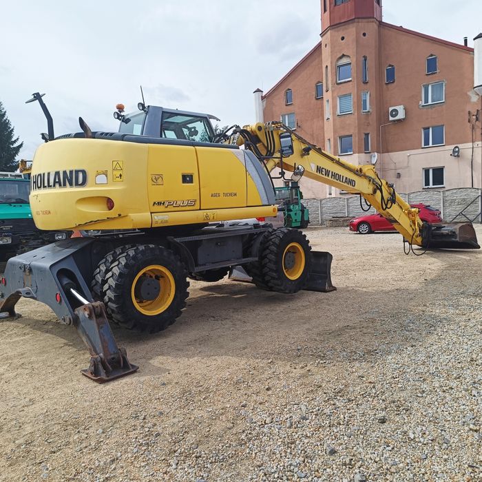 Maszyna budowlana koparka New Holland MH Plus  Ramie LONG