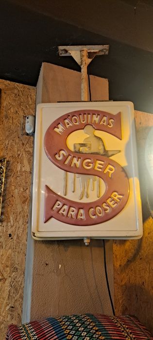 Reclame luminoso Singer