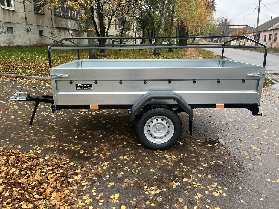 Причіп розміром 2.56 м Х 1.31 м Х 45 см