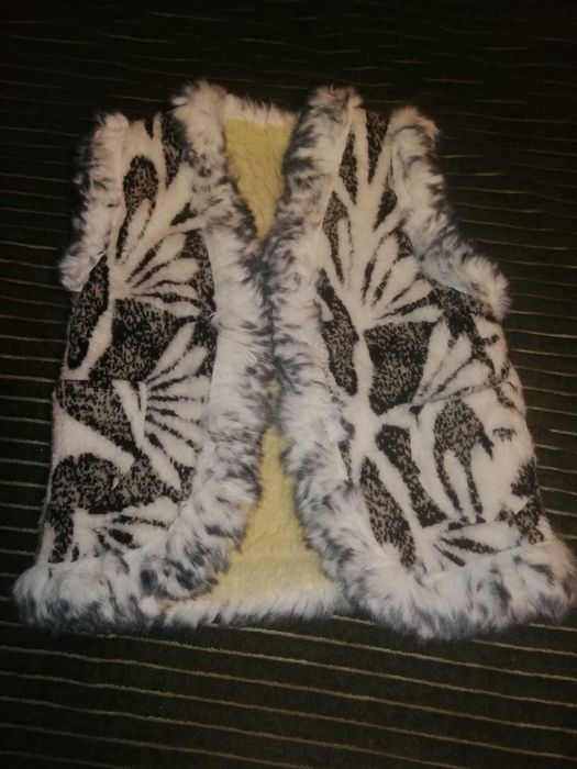 Безрукавка на овчині