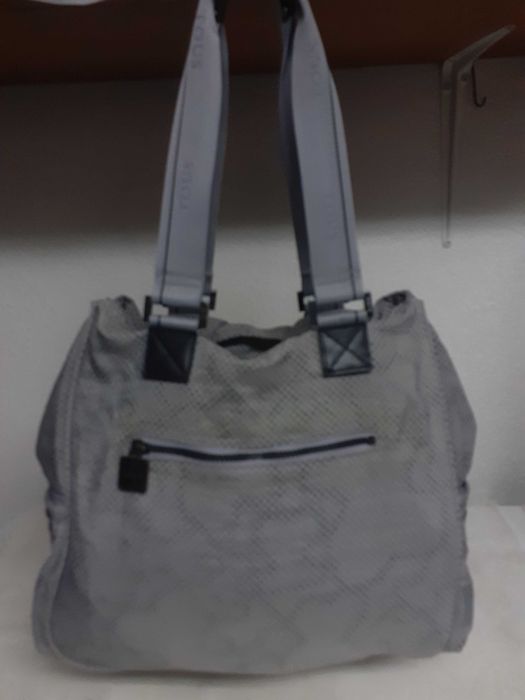 Mala senhora da Tous