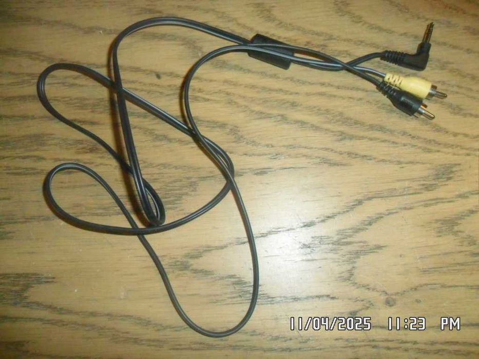 Canon: instrukcja (PowerShot SX100 IS) + kabel ( AVC-D300)