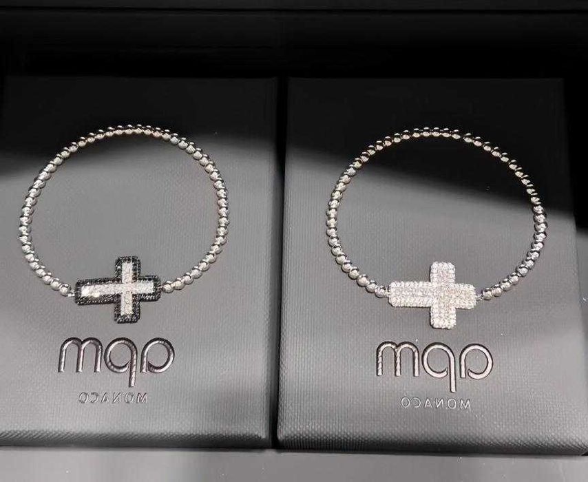 Elegancka bransoletka APM Monaco – czarny krzyż z kryształkami