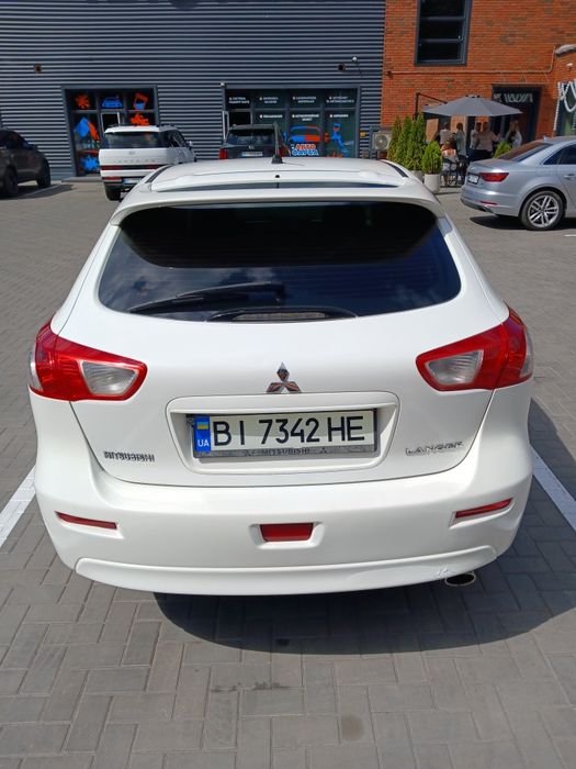 Mitsubishi Lancer 2009 VIN JMBLTCX3A9U002885 фото оголошення 5 з 18