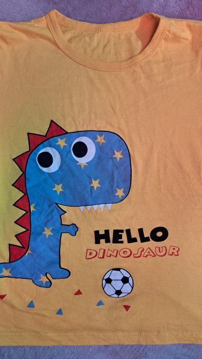 Koszulka 110 żółta z dinozaurem stan bdb