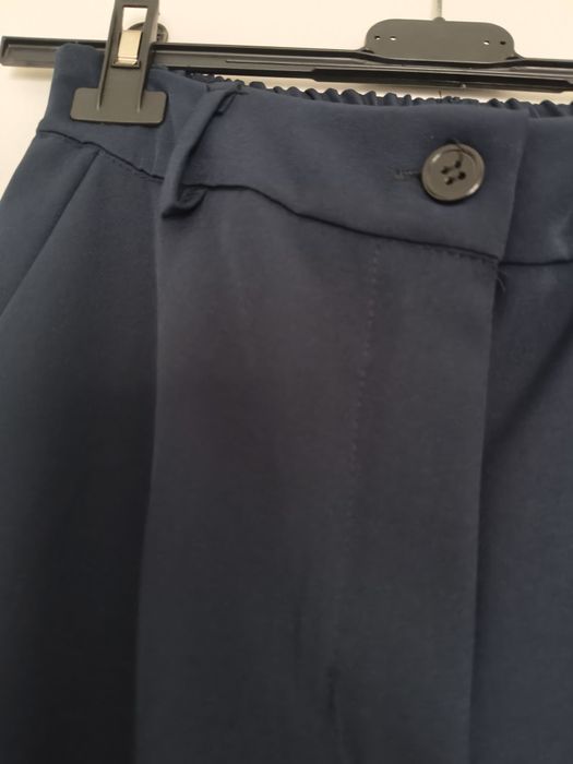 Calças azuis escuras c/etiqueta