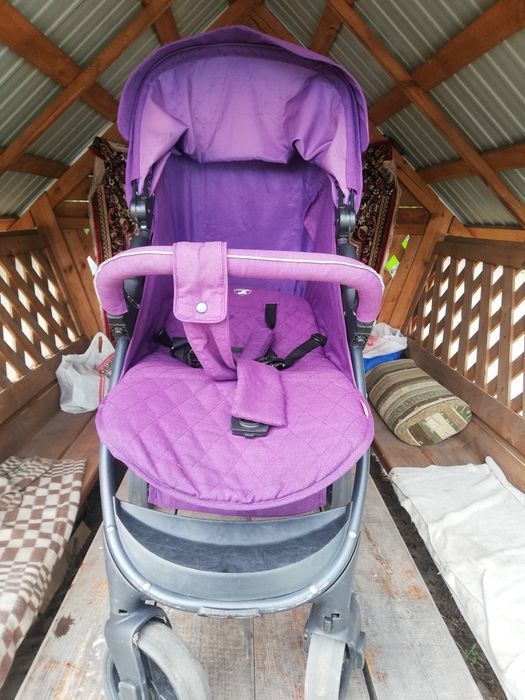 Дитяча прогулочная коляска