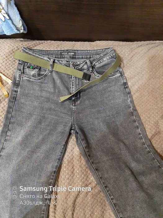 Продам джинси сірого кольору