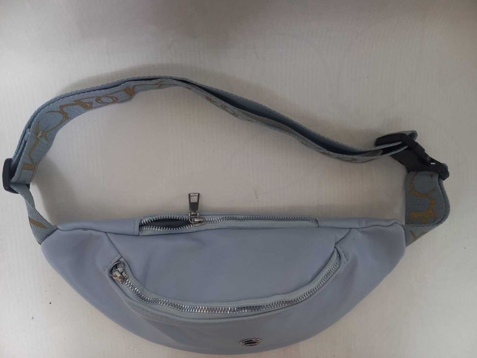 Жіноча барсетка -бананка