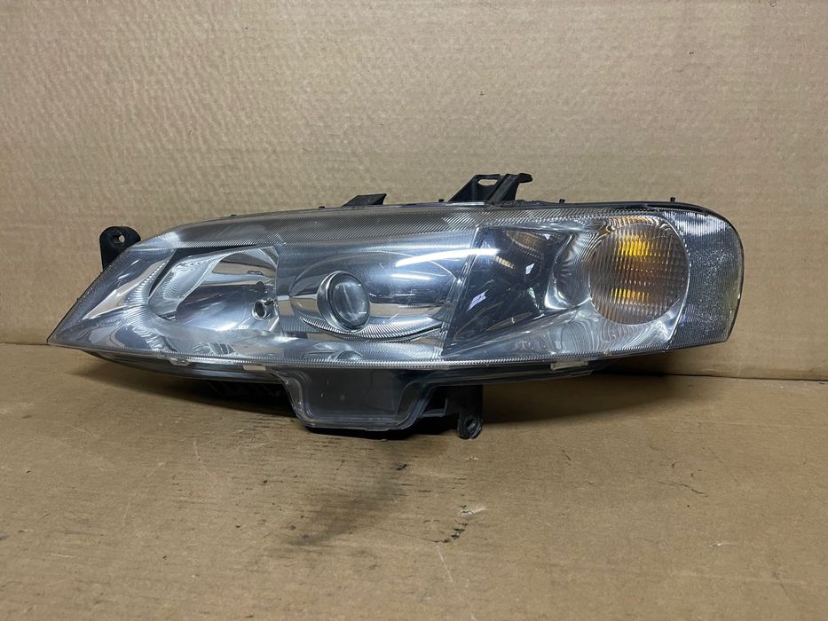 FAROL OPTICA XENON FRENTE ESQUERDA OPEL VECTRA B 1999 A 2002