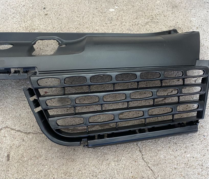 Grelha frontal renault clio