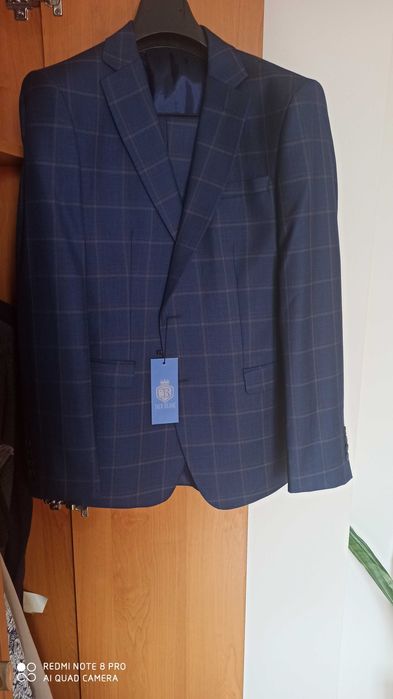 Garnitur nowy roz 52 slim, dowóz do 35 km