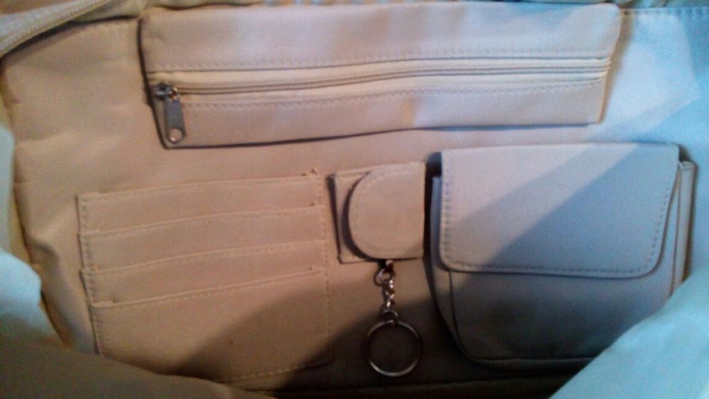 Torebka na laptop,dokumenty lub do pracy.