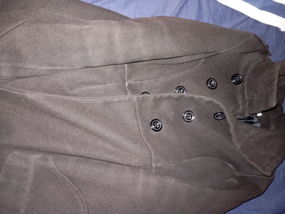 Casaco de senhora cintado, muito usado