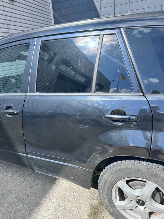 Drzwi tylne lewe w kolorze ZJ3 - Grand Vitara 2