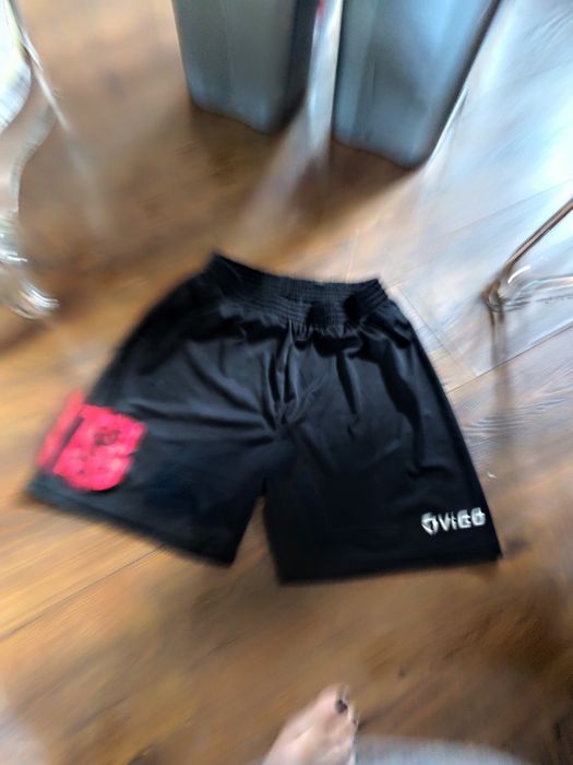 Dwie pary Adidas spodnie bramkarskie  S młodzieżowe i spodenki czarne