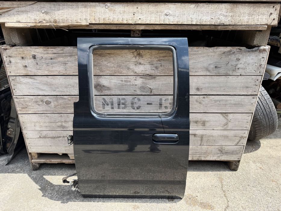 Porta tras esquerda Nissan Navara D22