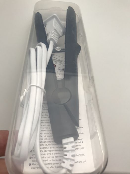 Випрямлювач волося плойка