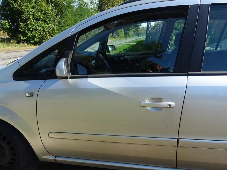 DRZWI LEWY PRZÓD LEWE PRZEDNIE OPEL ZAFIRA B Z157 2AU SREBRNY