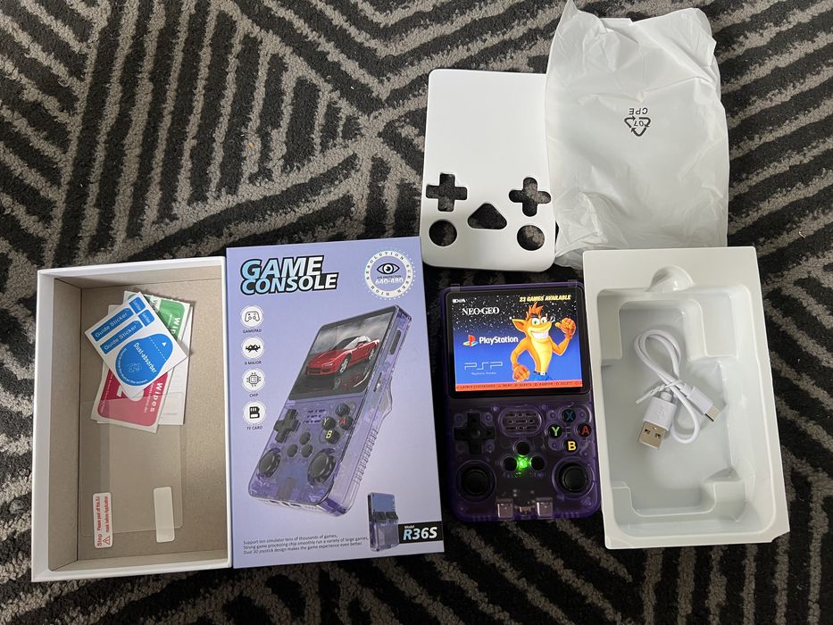 Consola Portátil Retro R36S - Roxa Transparente