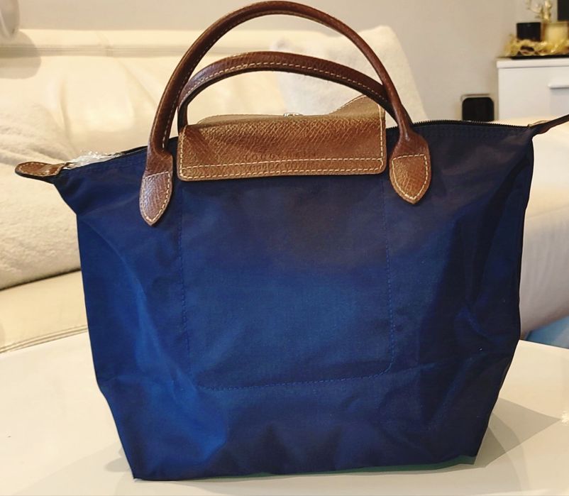 Oryginalna Torebka Longchamp.Kolor granatowy z elementami ze skóry