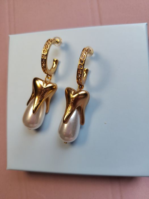 Серьги Schiaparelli.