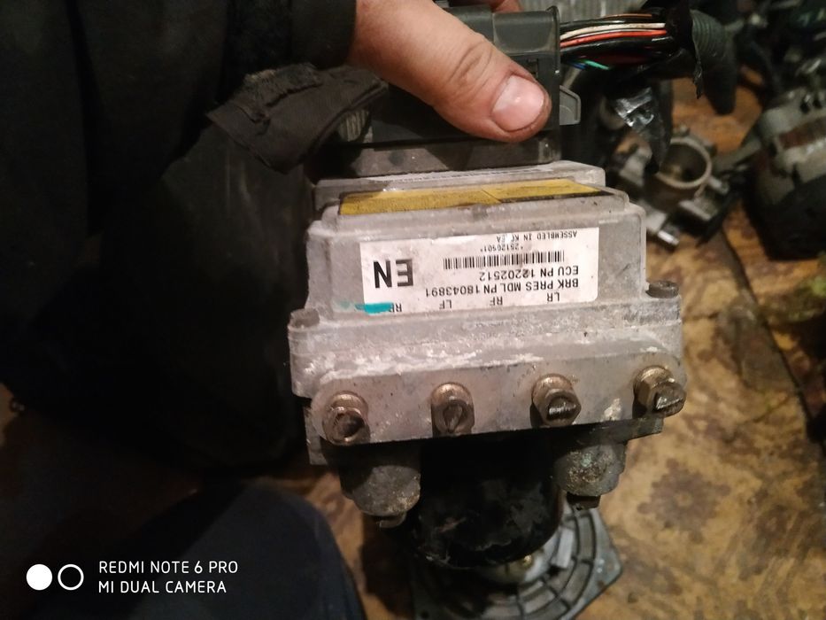 Chevrolet Aveo 04-11рік генератор 1.5