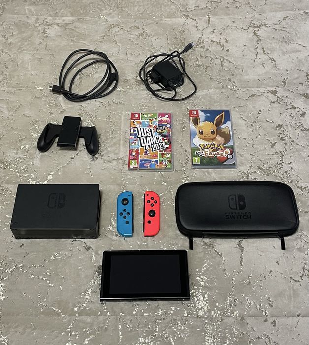 Nintendo Switch V2, 2 comando,2 jogos e bolsa de transporte