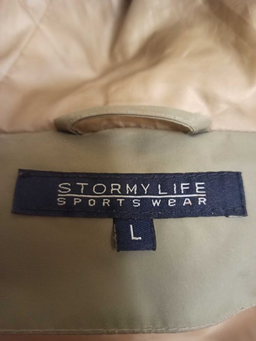 Пуховик оливковий