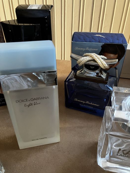 Kolekcjonerski zestaw flakonów po perfumach MCM