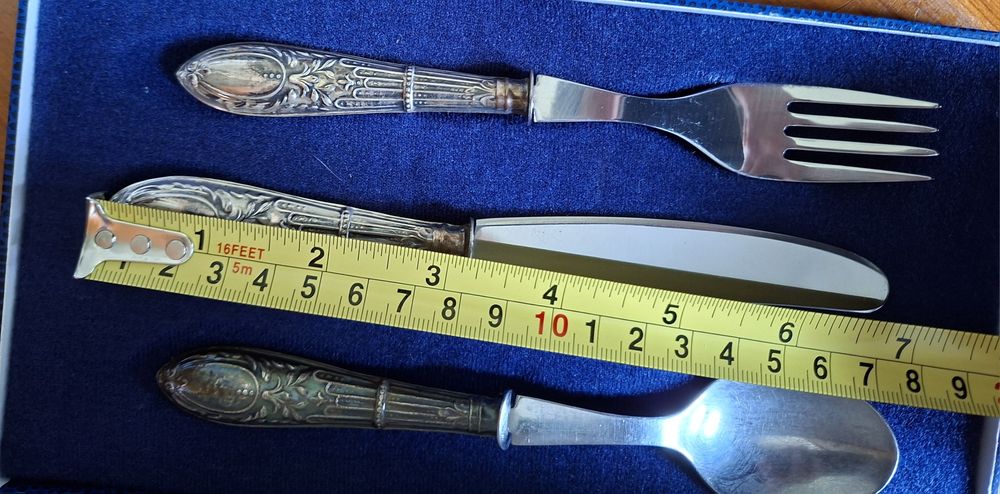 Silver cutlery.       .474689553144883203